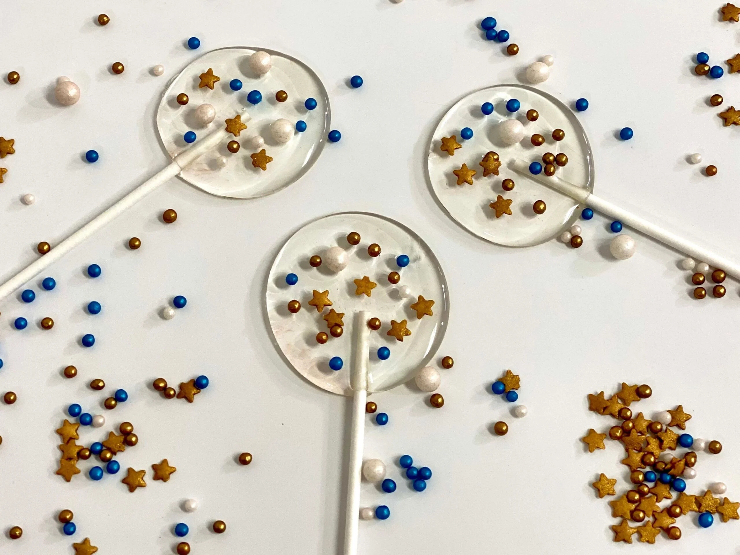 Sucettes personnalisées avec des paillettes bleues de Noël