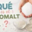 Qué es el isomalt, gránulos en mano y piruletas transparentes